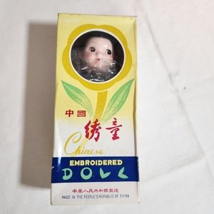 Chinese embroidered doll NIB